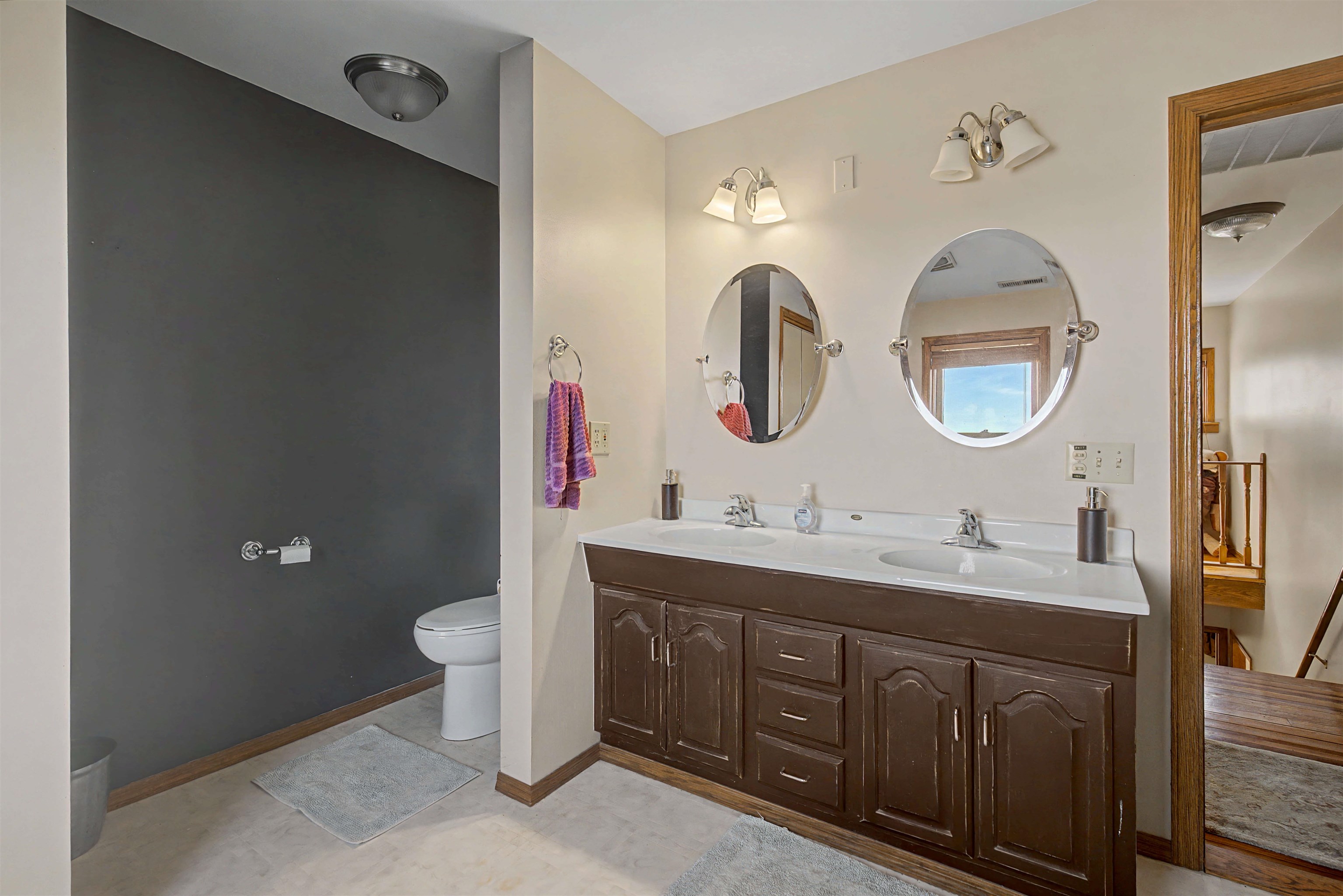 115 Windmill Road Elizabeth, IL 61028 - Photo 11 of 82 a bathroom with a double vanity sink and a mirror