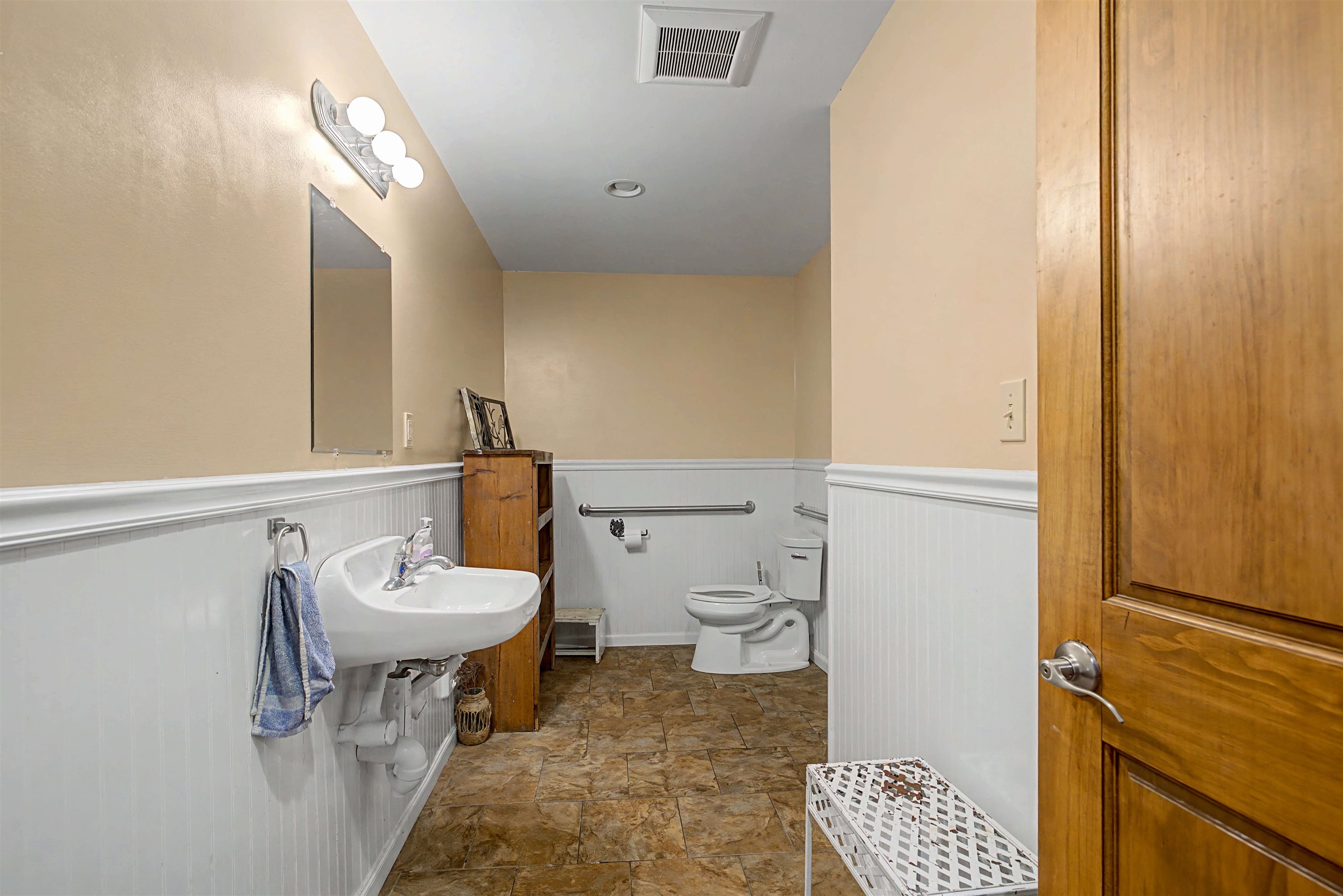 115 Windmill Road Elizabeth, IL 61028 - Photo 20 of 82 a bathroom with a sink a toilet and a mirror
