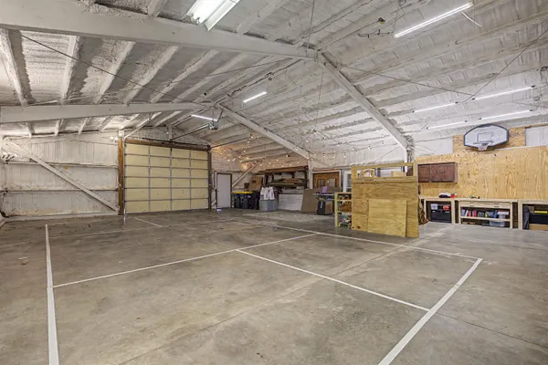 a view of a chairs and a table in the balcony