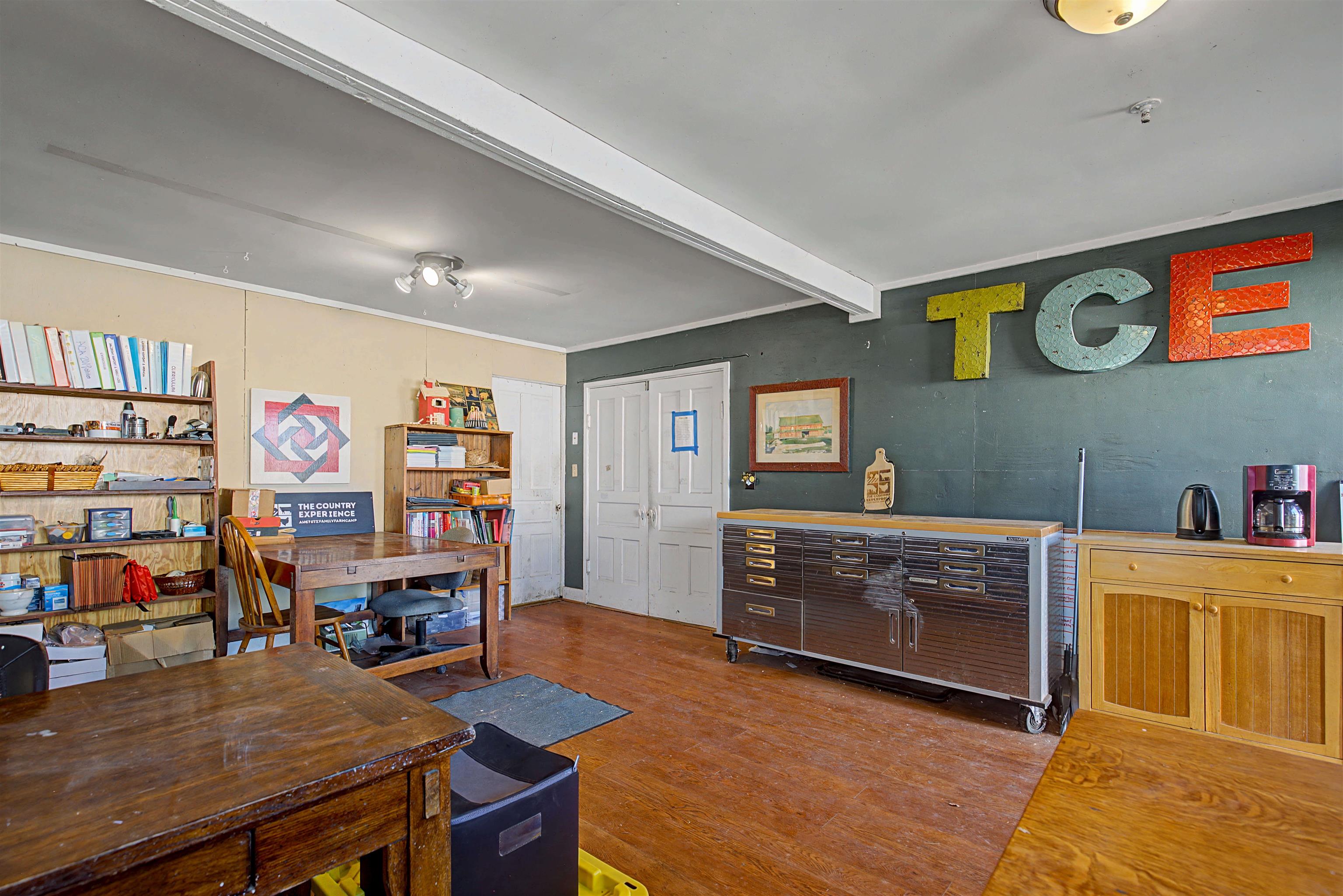 115 Windmill Road Elizabeth, IL 61028 - Photo 26 of 82 a room with furniture and a wooden floor