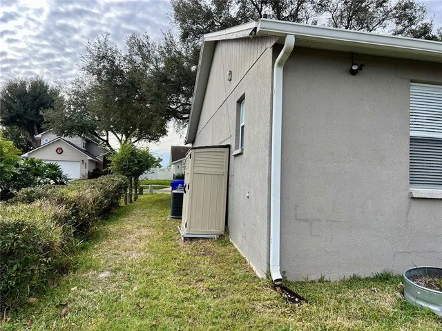 a view of a back yard of the house