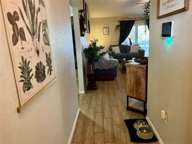 a view of entryway with wooden floor