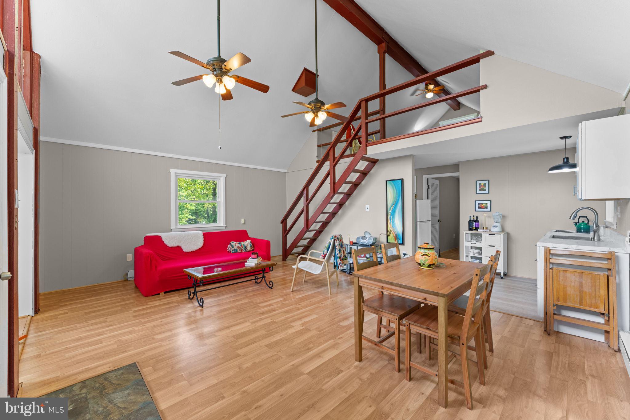 293 Old Sawmill Road Front Royal, VA 22630 - Photo 20 of 68 a living room with furniture and wooden floor