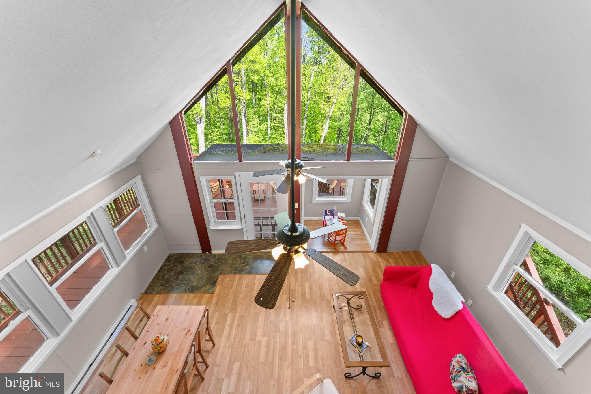 293 Old Sawmill Road Front Royal, VA 22630 - Photo 24 of 68 a view of living room with furniture and floor to ceiling window