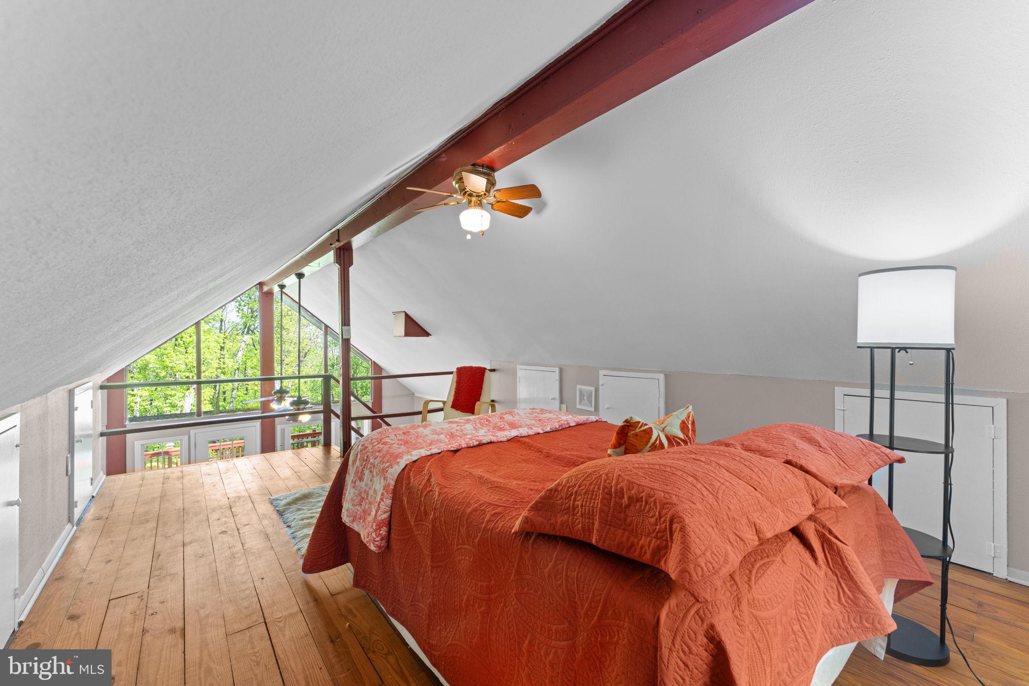 293 Old Sawmill Road Front Royal, VA 22630 - Photo 26 of 68 a bed sitting in a bedroom next to a window
