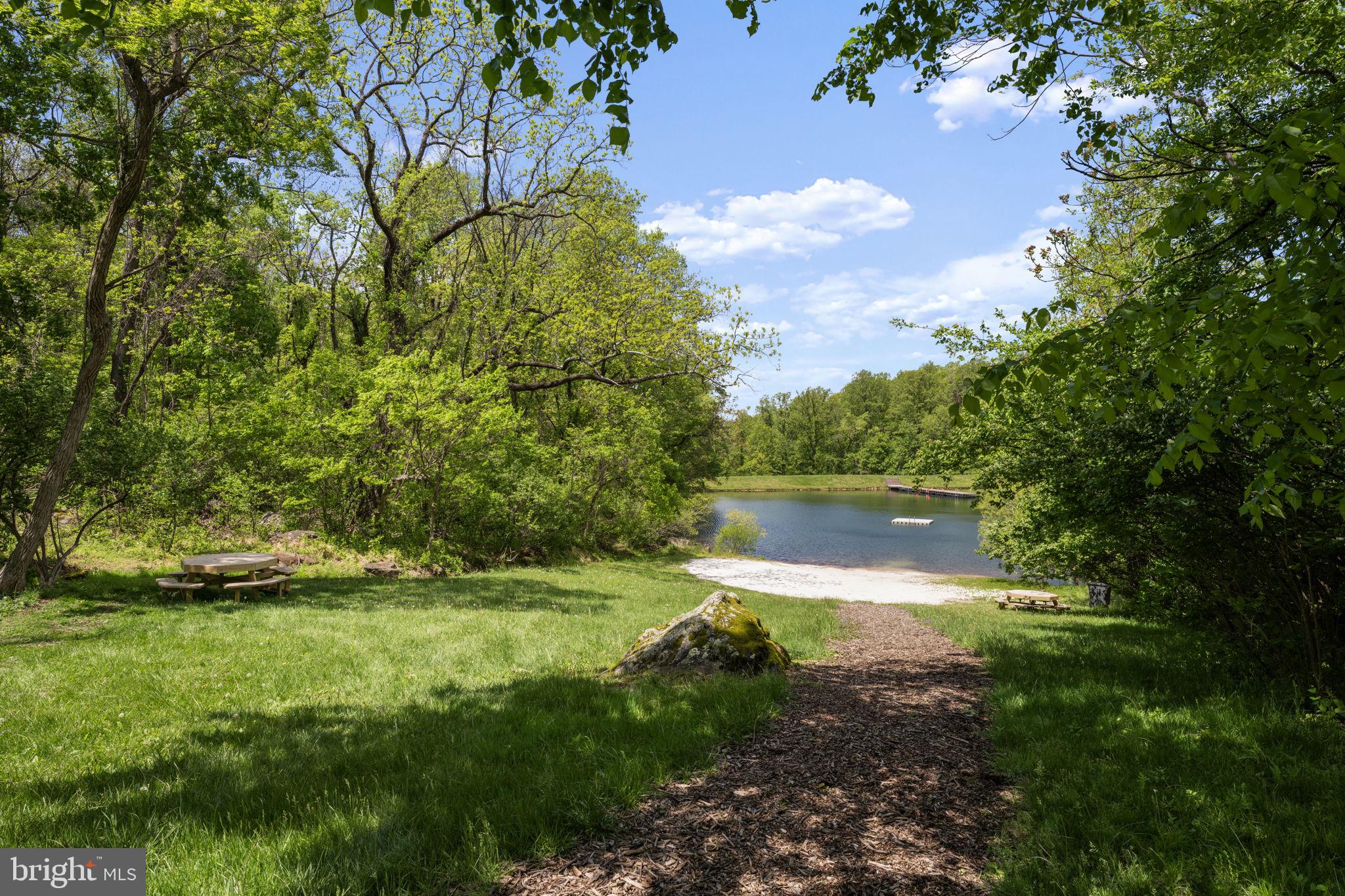 293 Old Sawmill Road Front Royal, VA 22630 - Photo 49 of 68 a view of a lake with a yard