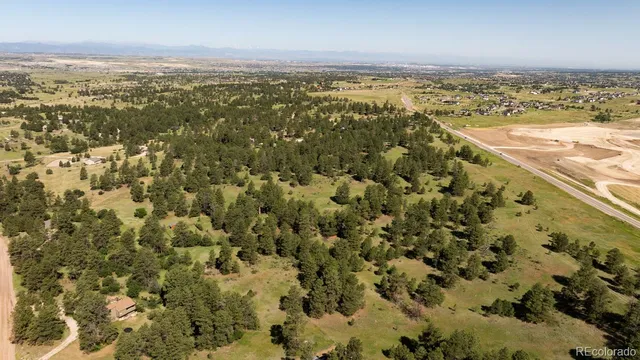 $890,000 | 10348 Pine Song Place, Parker, CO 80134