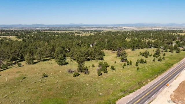 $890,000 | 10348 Pine Song Place, Parker, CO 80134