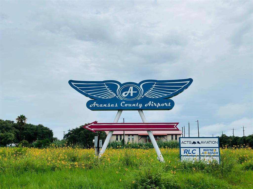 a sign that is sitting on the floor in front of a house