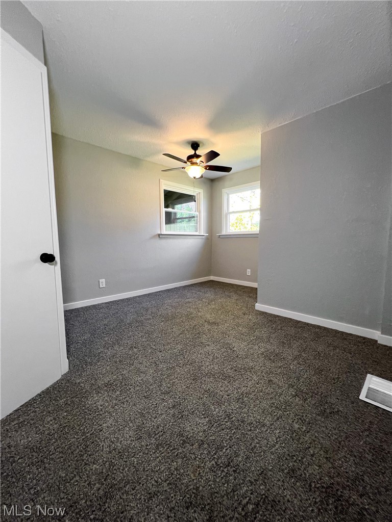 602 West Marshall Road McDonald, OH 44437 - Photo 17 of 19 Carpeted bedroom featuring ceiling fan