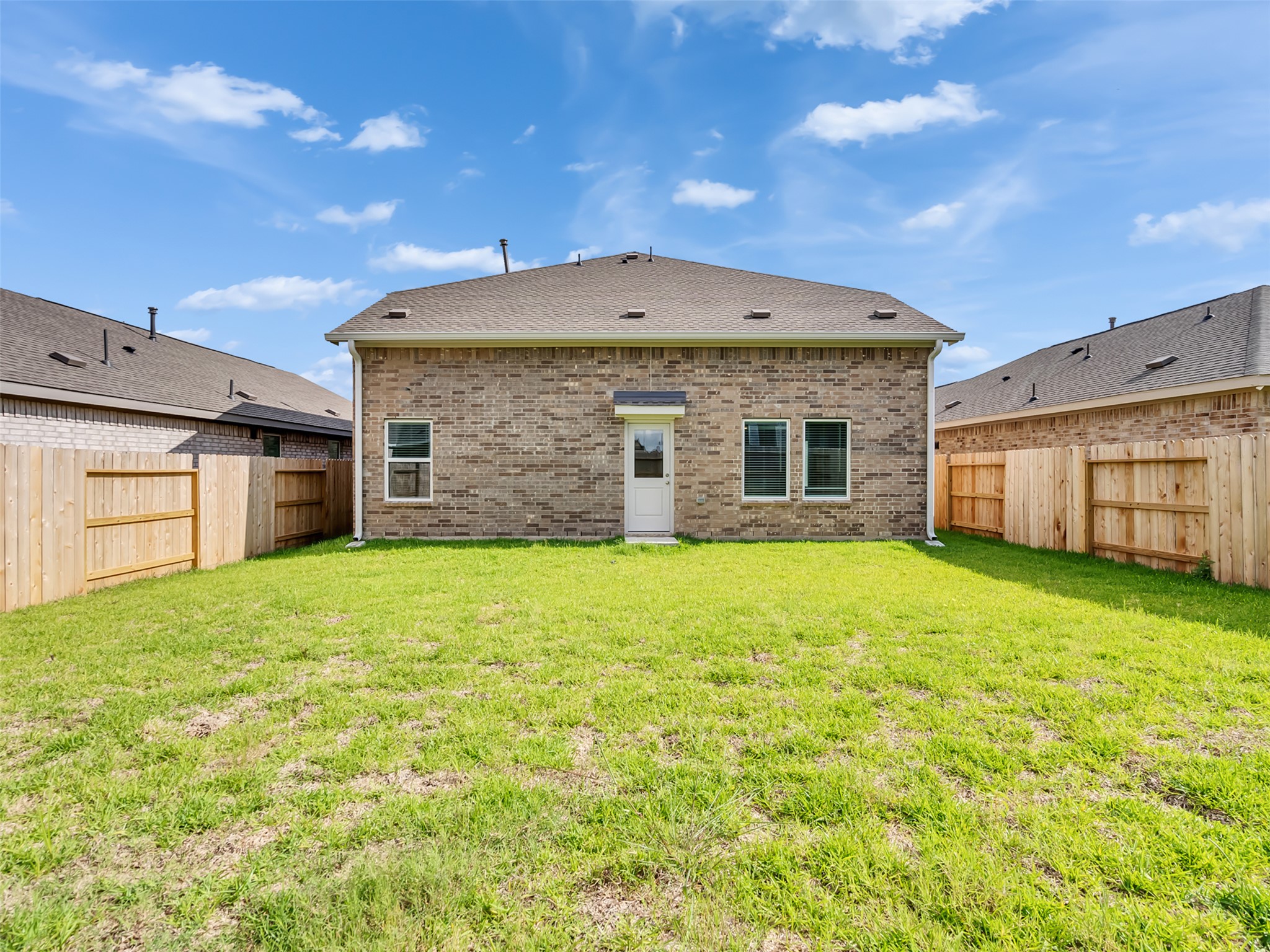 3041 Colusa Rdg Drive Katy, TX 77493 - Photo 22 of 26 a front view of a house with a garden