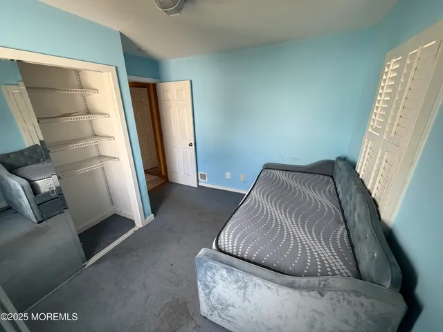 a living room with furniture and a gate