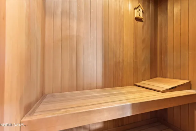 a bathroom with a shower curtain and curtain