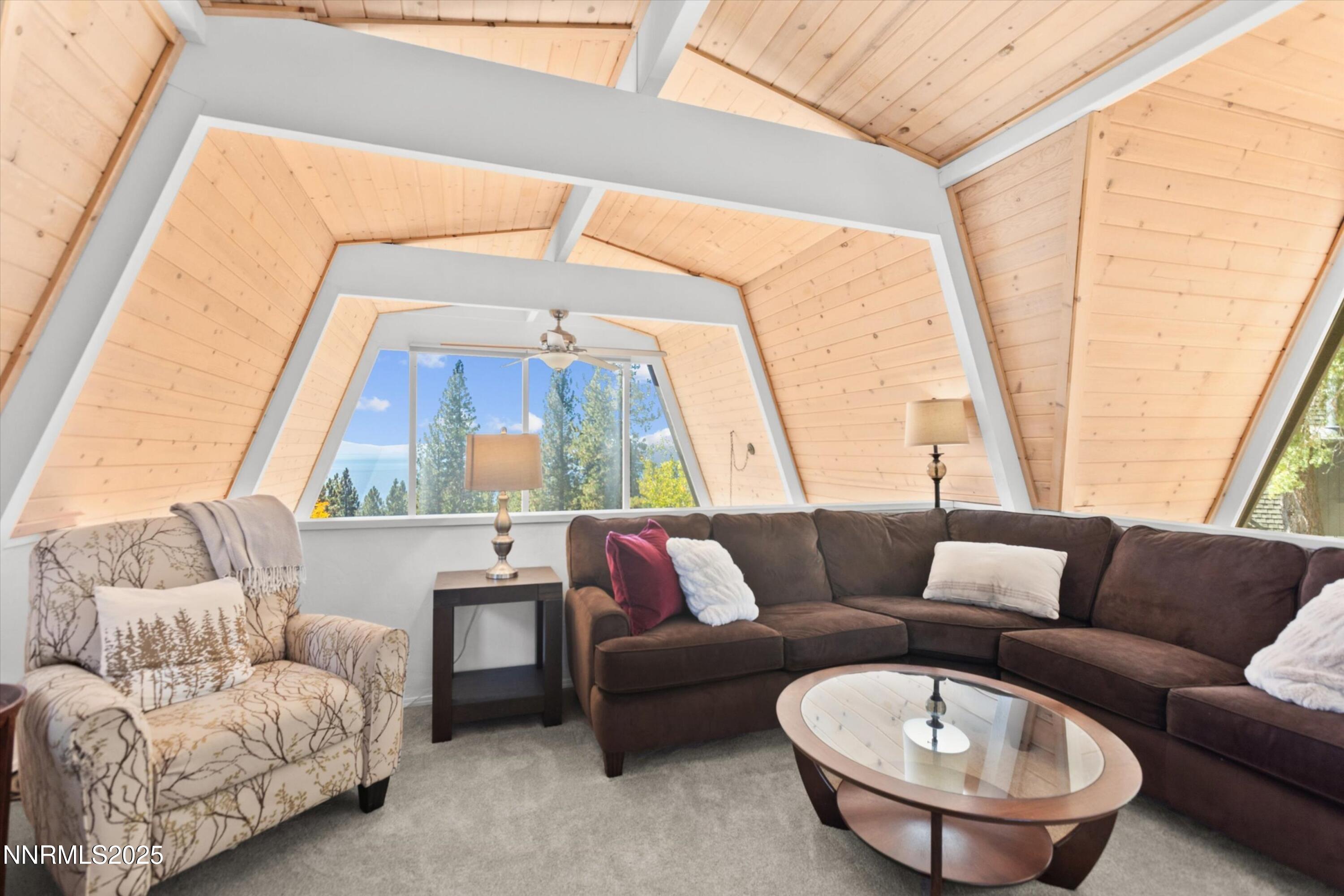 456 Jill Court Incline Village, NV 89451 - Photo 24 of 38 a living room with furniture and a large window