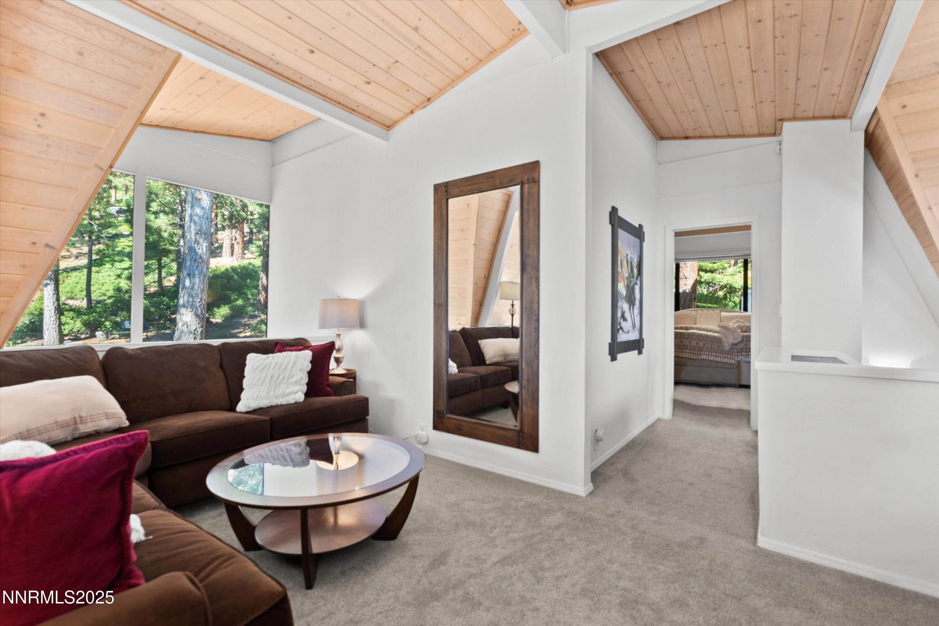 456 Jill Court Incline Village, NV 89451 - Photo 25 of 38 a living room with furniture and a large window
