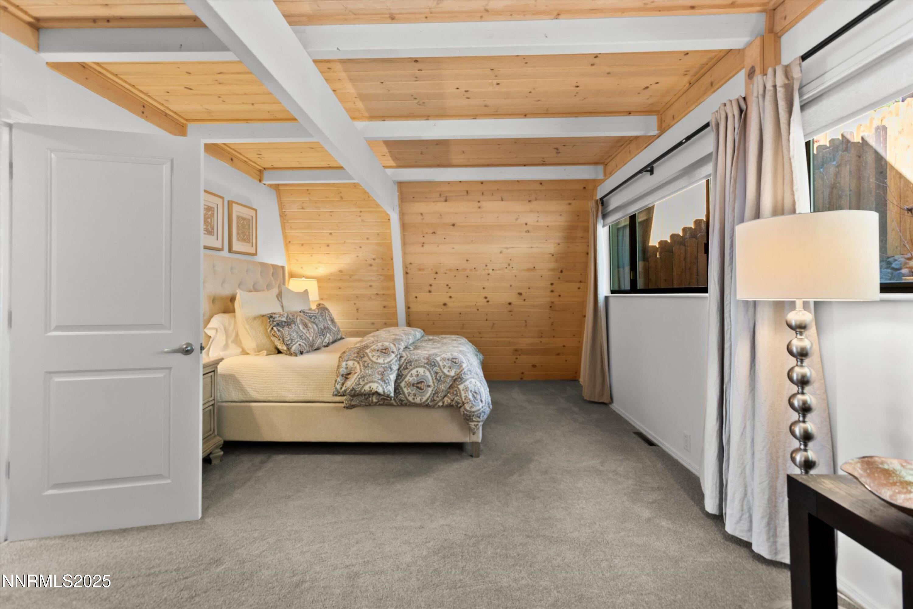 456 Jill Court Incline Village, NV 89451 - Photo 29 of 38 a bedroom with furniture and window