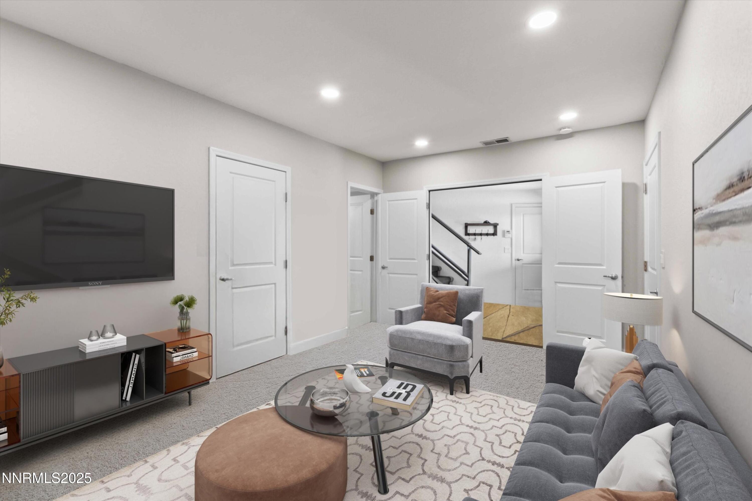 456 Jill Court Incline Village, NV 89451 - Photo 32 of 38 a living room with furniture and a flat screen tv