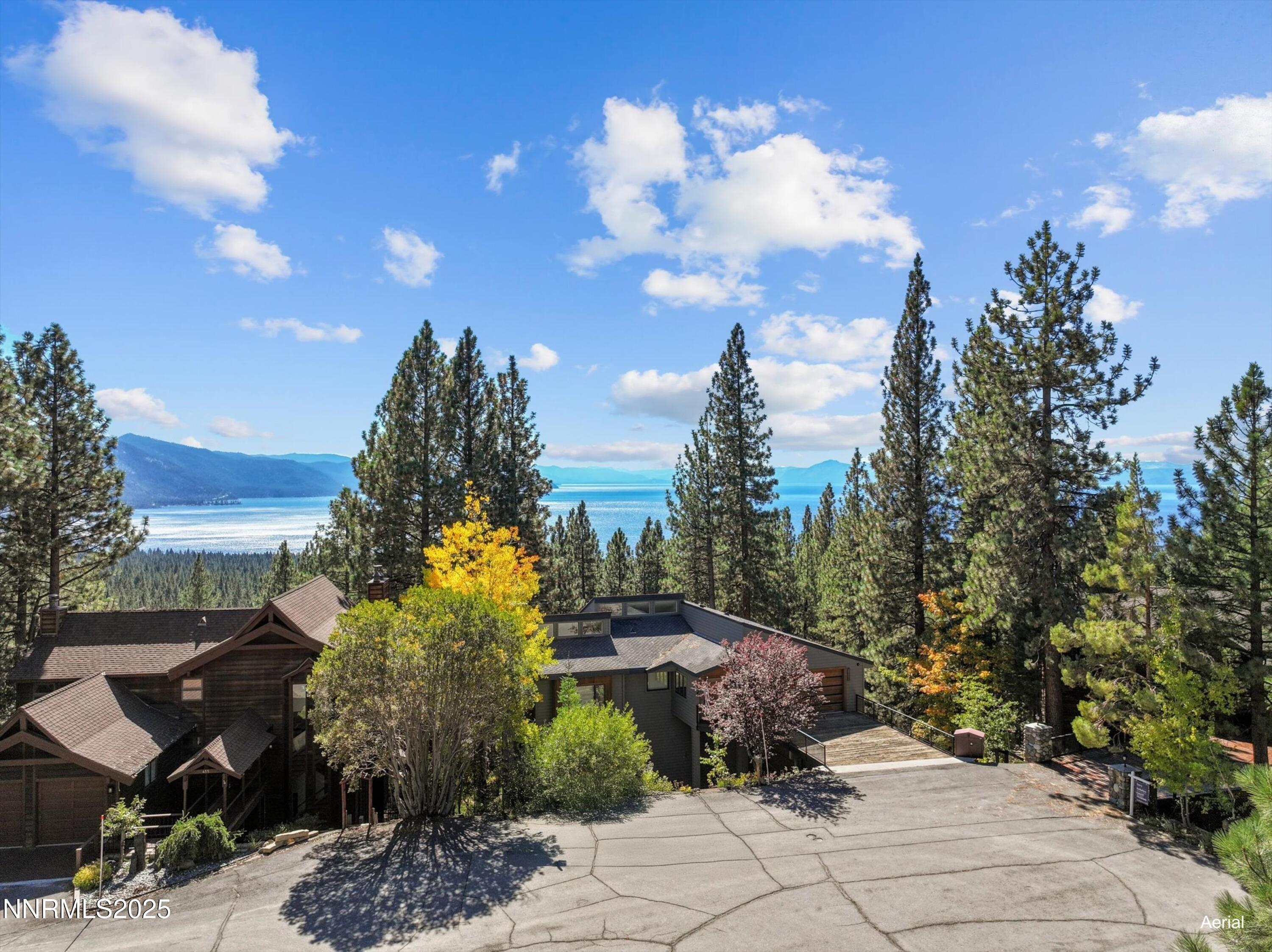 456 Jill Court Incline Village, NV 89451 - Photo 4 of 38 a view of a yard in front of the house