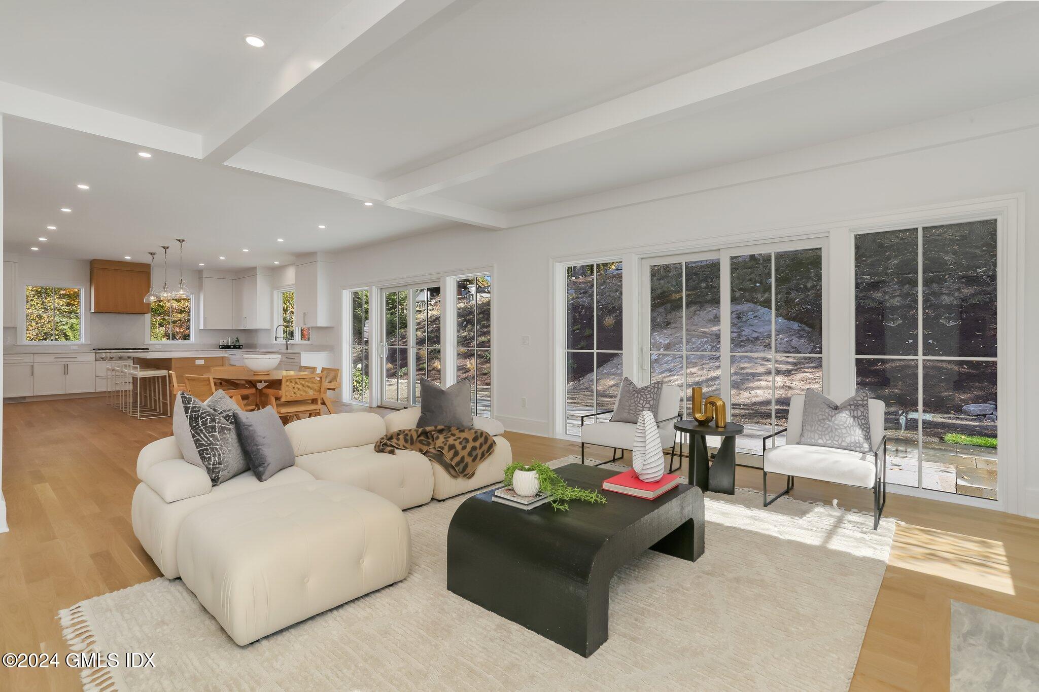 86 Mary Lane Riverside, CT 06878 - Photo 10 of 28 a living room with furniture and a large window
