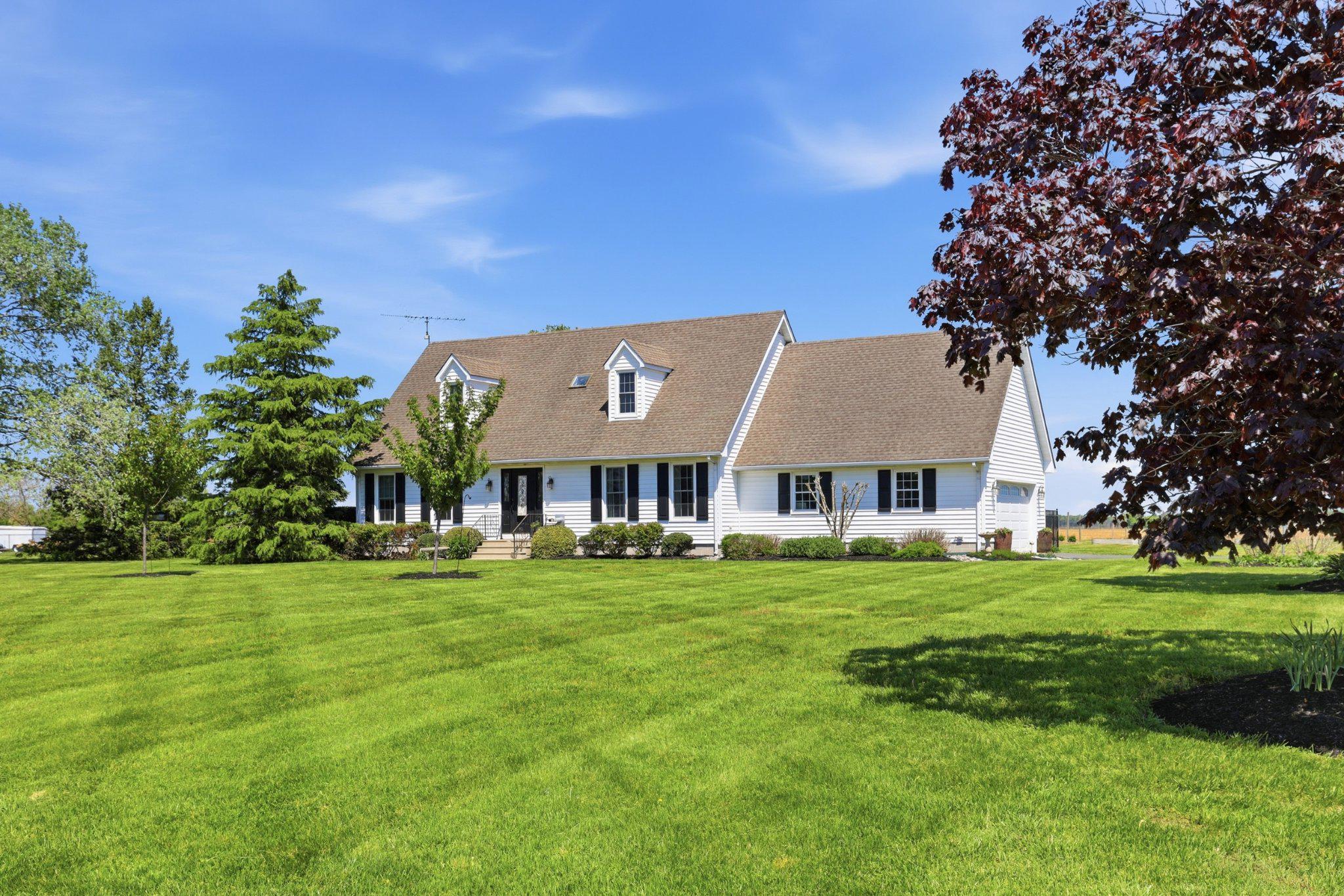 2246 Prospect Church Road Harrington, DE 19952 - Photo 41 of 47 a view of a big house with a big yard and large trees