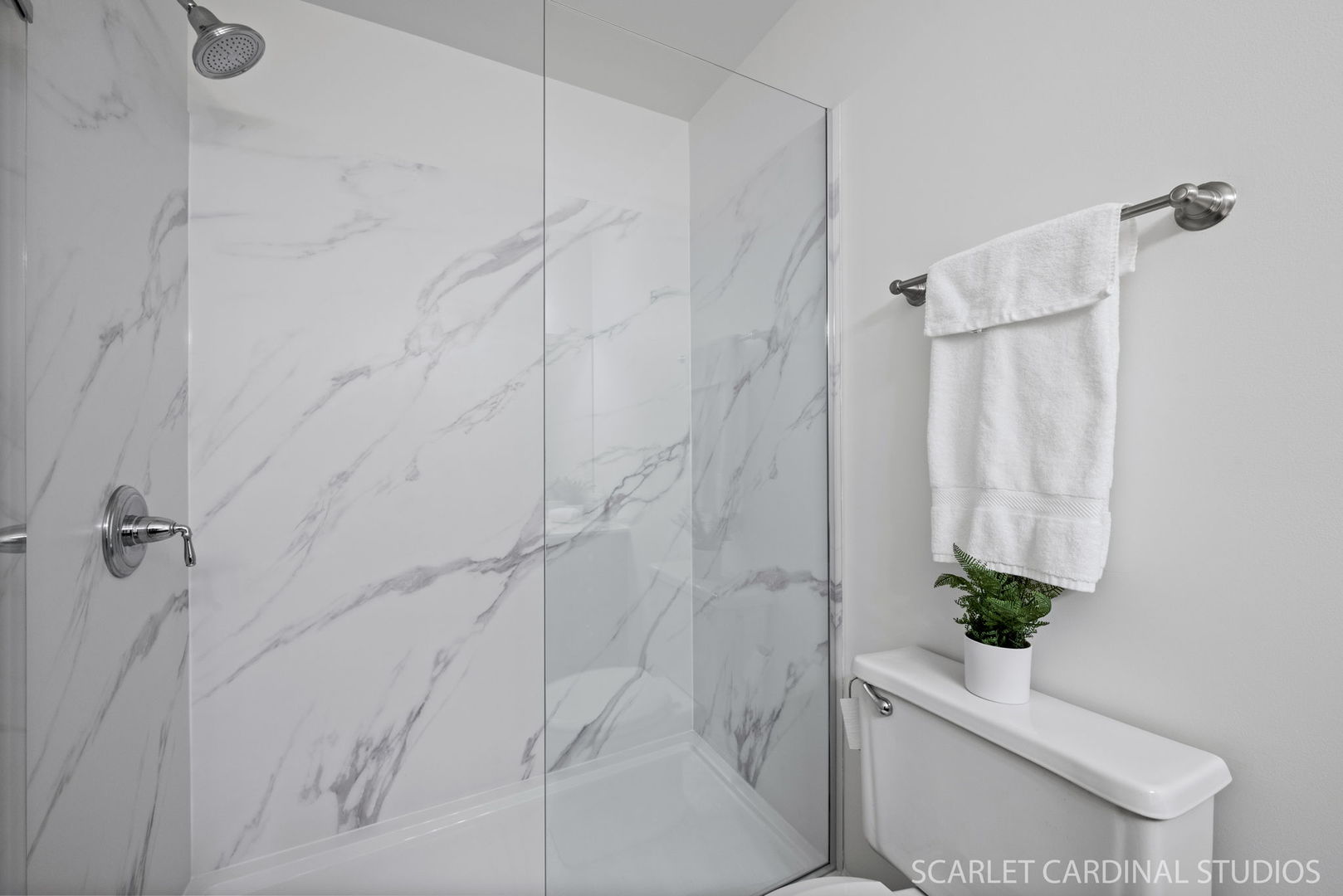 305 South Harrison Street, Unit 305 Geneva, IL 60134 - Photo 13 of 20 a bathroom with a toilet and shower