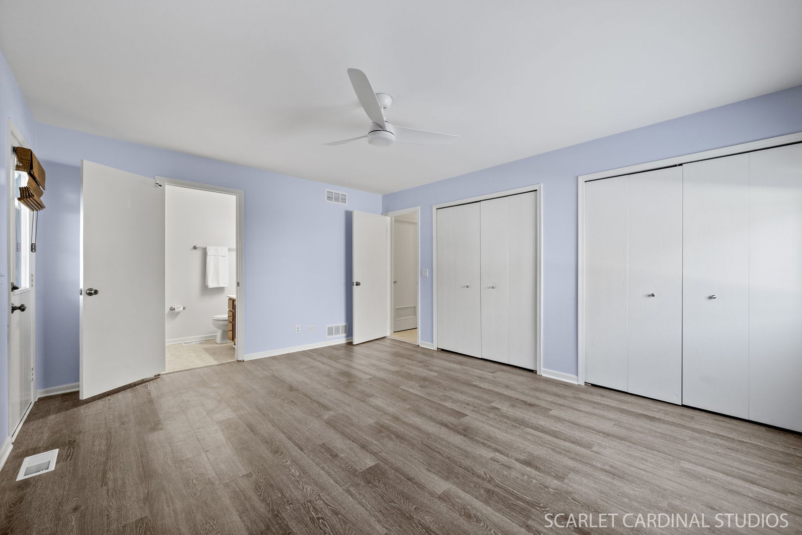 305 South Harrison Street, Unit 305 Geneva, IL 60134 - Photo 15 of 20 a view of an empty room with wooden floor