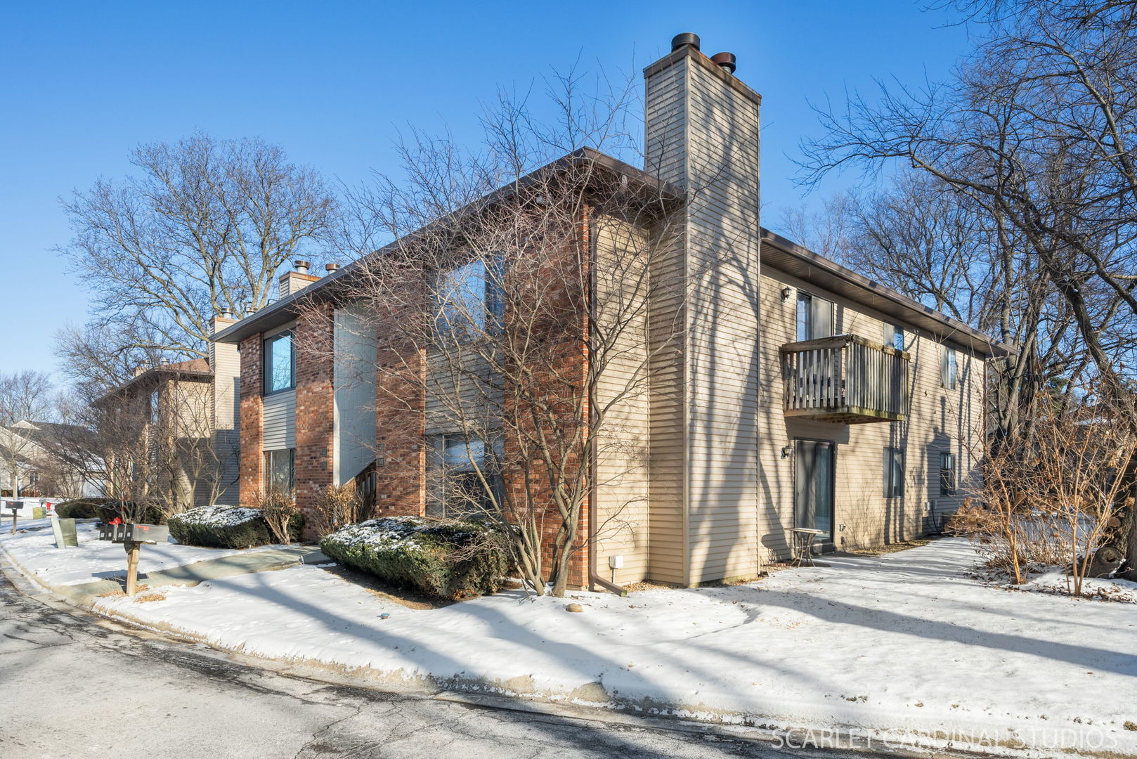 305 South Harrison Street, Unit 305 Geneva, IL 60134 - Photo 2 of 20 a view of a house with a yard