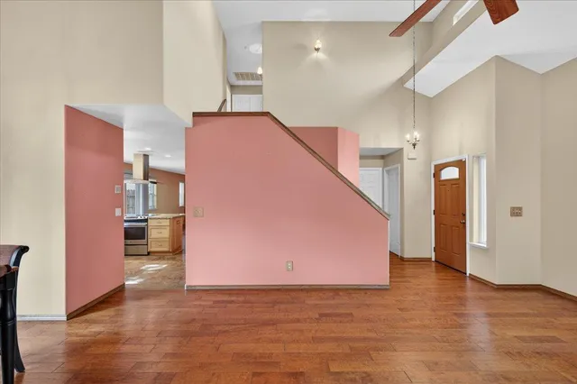 a bathroom with a sink and a mirror with bathtub