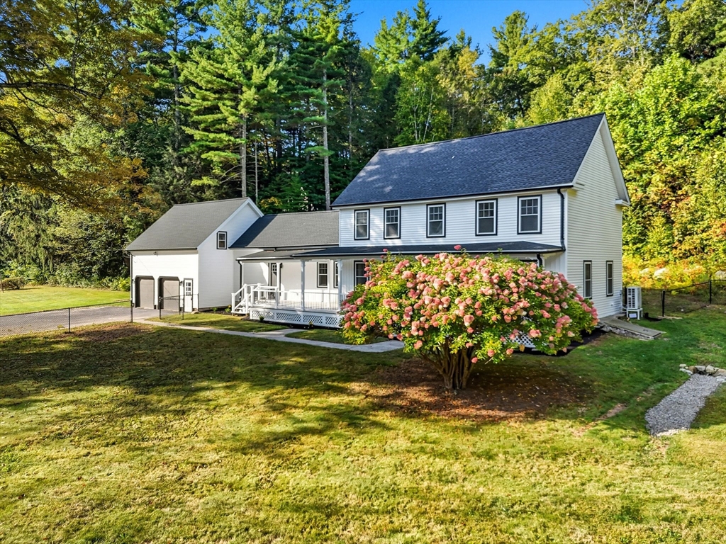 75 Lead Mine Road Southampton, MA 01073 - Photo 39 of 42 a front view of a house with a garden