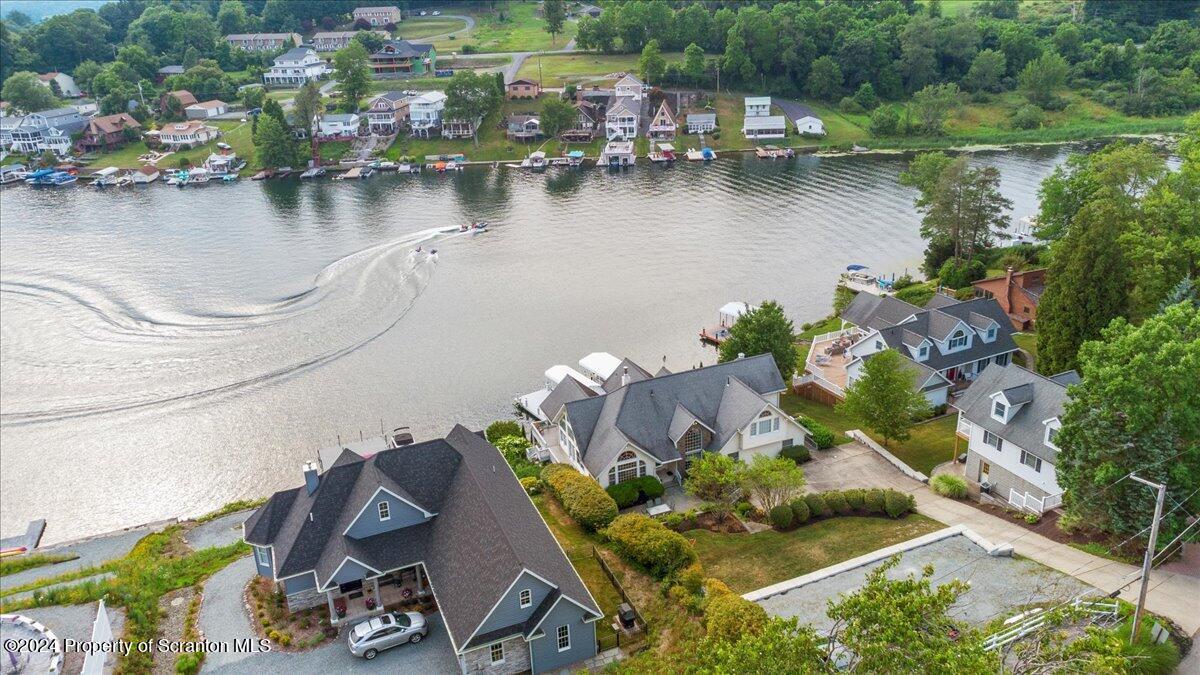 218 Point Road Lake Winola, PA 18419 - Photo 18 of 65 an aerial view of a house with outdoor space and lake view