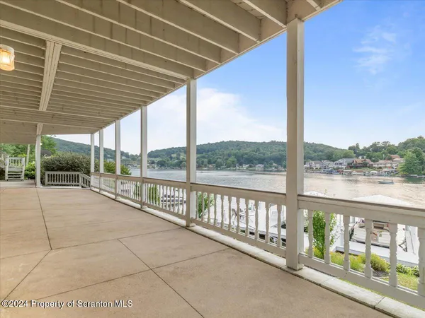 a view of a balcony with lake view