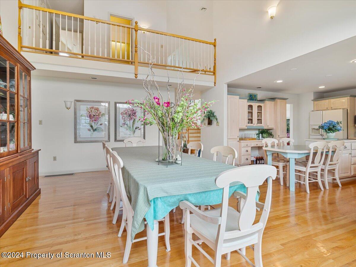218 Point Road Lake Winola, PA 18419 - Photo 44 of 65 a view of a dining room with furniture and a potted plant