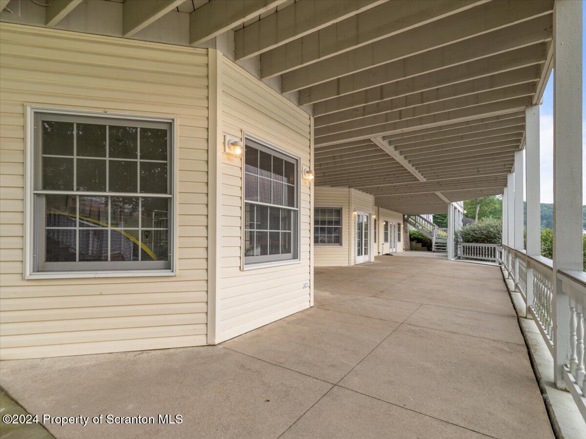 218 Point Road Lake Winola, PA 18419 - Photo 62 of 65 a view of a house with a large window