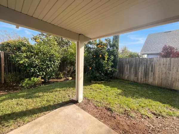 a view of a porch with a yard