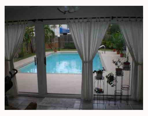 4315 Harrison Street Hollywood, FL 33021 - Photo 4 of 10 a view of a porch