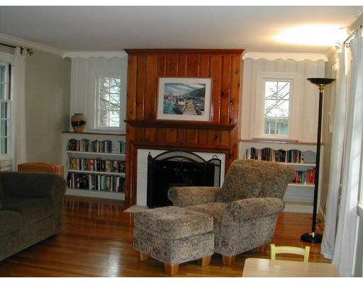11 Tamarac Road Newton, MA 02464 - Photo 4 of 9 a living room with furniture and a fireplace