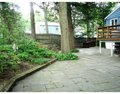11 Tamarac Road Newton, MA 02464 - Photo 9 of 9 a front view of a house with garden