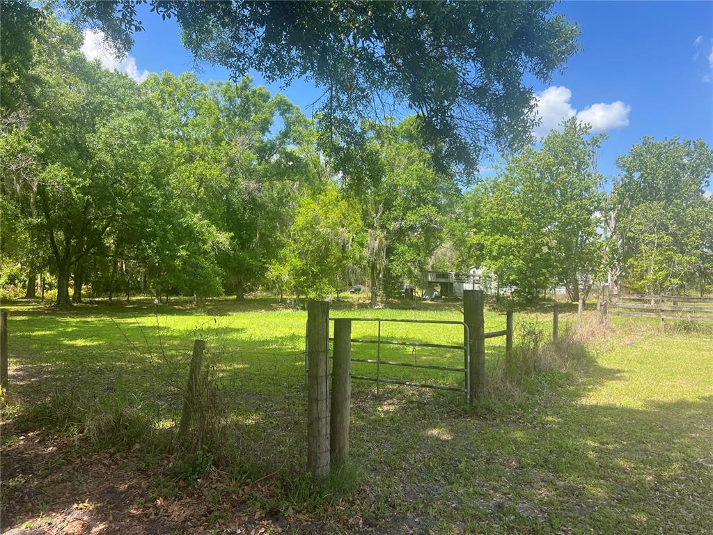 5855 Jack Brack Road St. Cloud, FL 34771 - Photo 50 of 86 a view of lake with green space