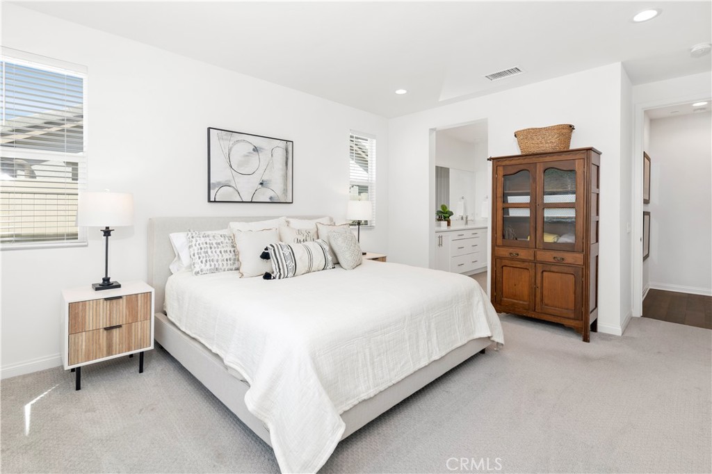 32037 Sedge Way Temecula, CA 92591 - Photo 26 of 61 a bedroom with a bed and a window