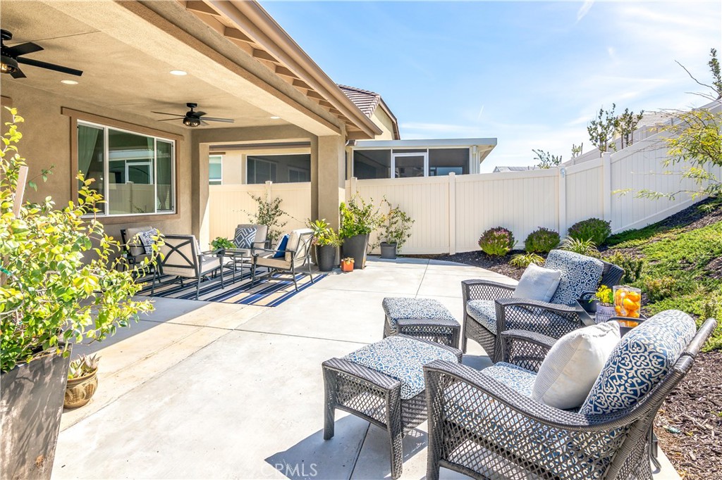 32037 Sedge Way Temecula, CA 92591 - Photo 34 of 61 a building outdoor space with patio furniture