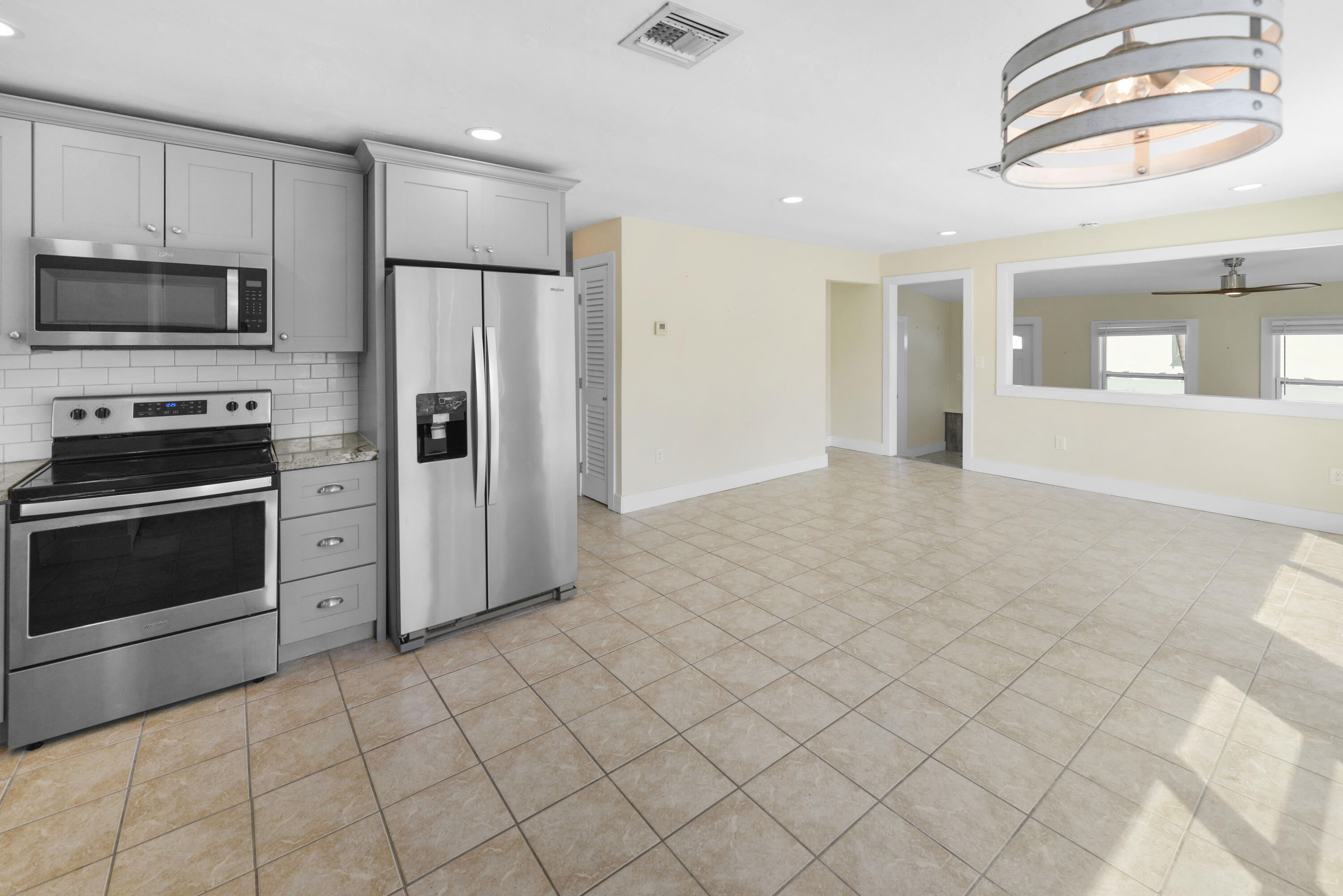 30868 Malaga Lane Big Pine Key, FL 33043 - Photo 17 of 34 a view of a kitchen with an oven and cabinets