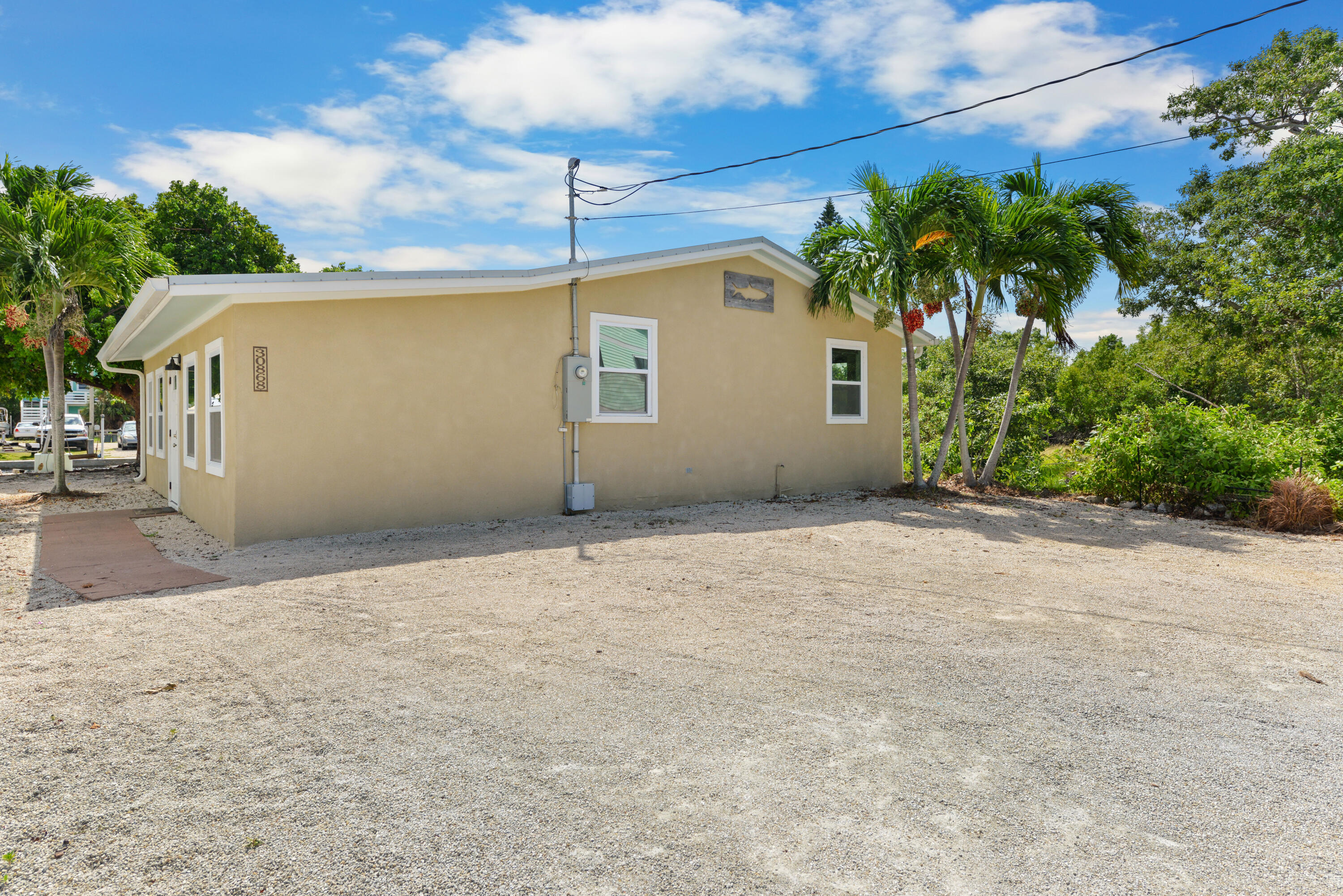 30868 Malaga Lane Big Pine Key, FL 33043 - Photo 2 of 34 a view of backyard of house