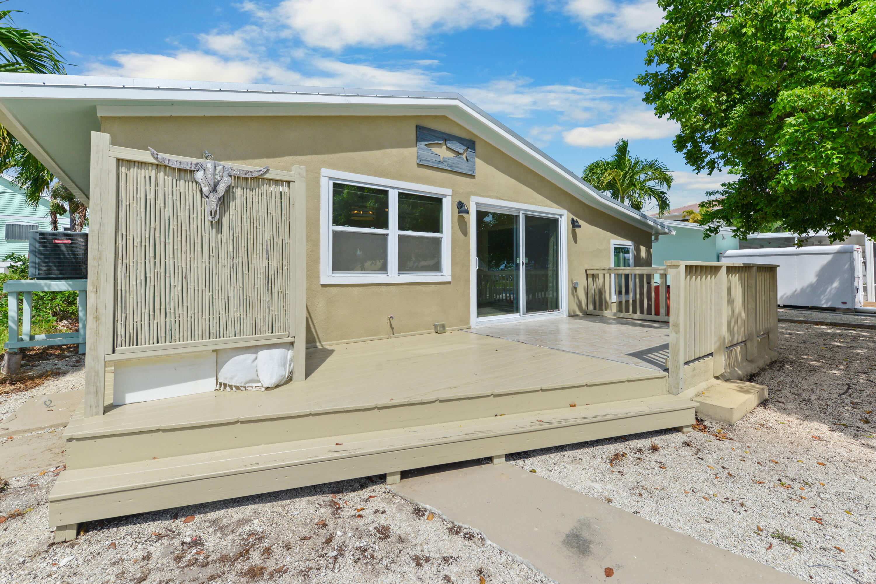 30868 Malaga Lane Big Pine Key, FL 33043 - Photo 29 of 34 a front view of a house with a yard