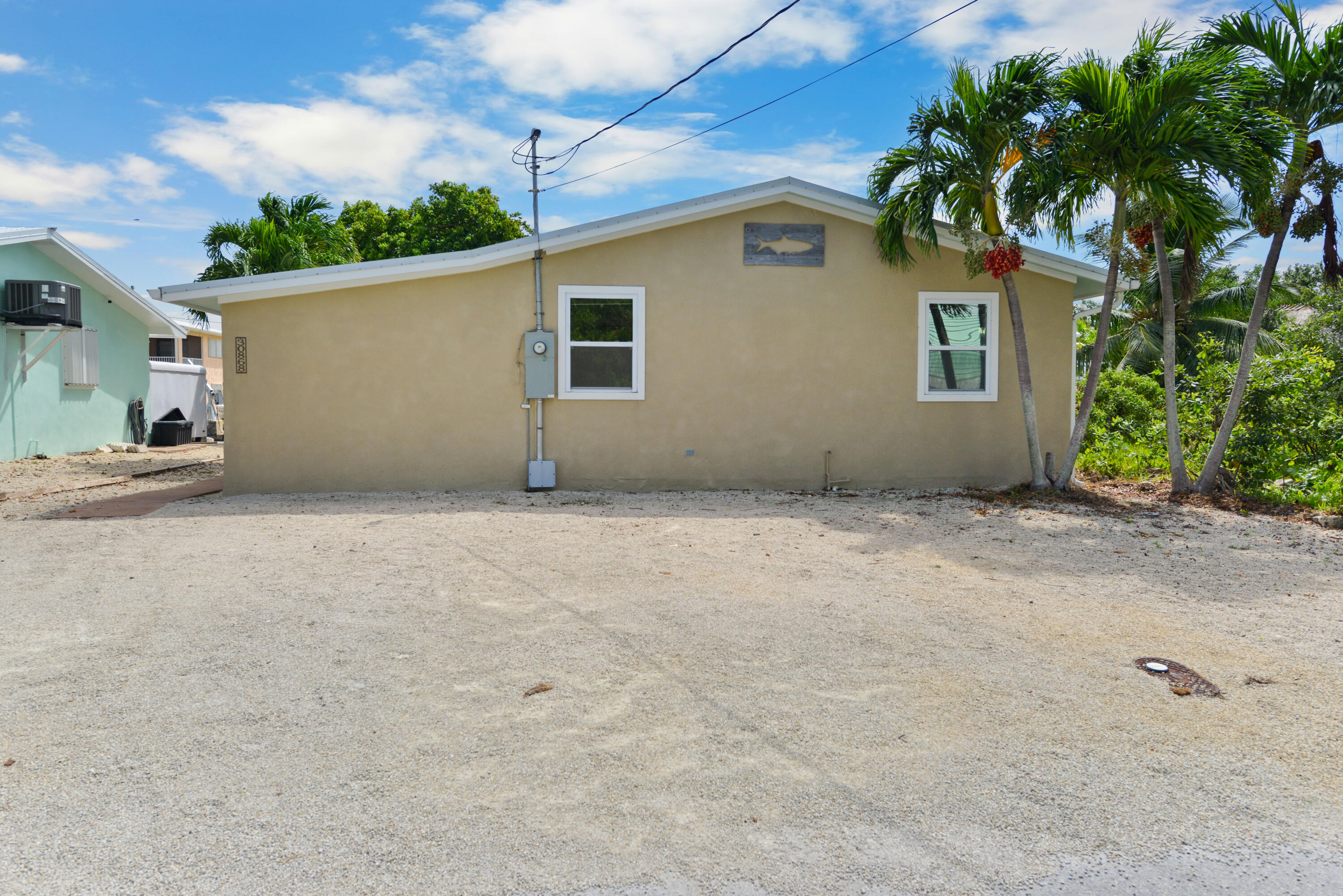 30868 Malaga Lane Big Pine Key, FL 33043 - Photo 34 of 34 front view of a house with a yard