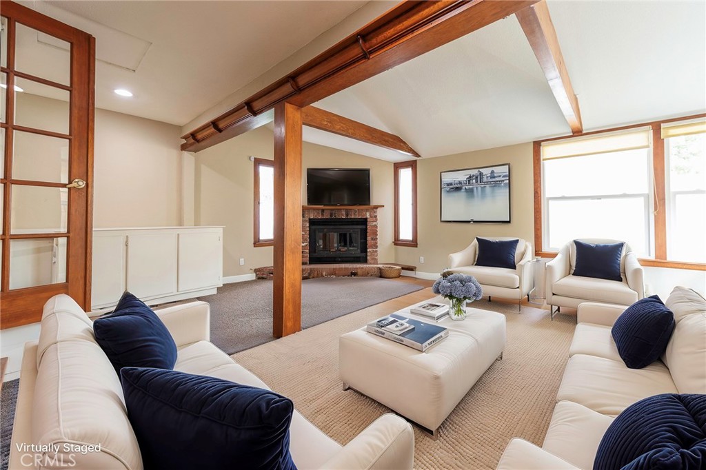 4697 Sierra Street Riverside, CA 92504 - Photo 13 of 51 a living room with furniture or outdoor view and a large window