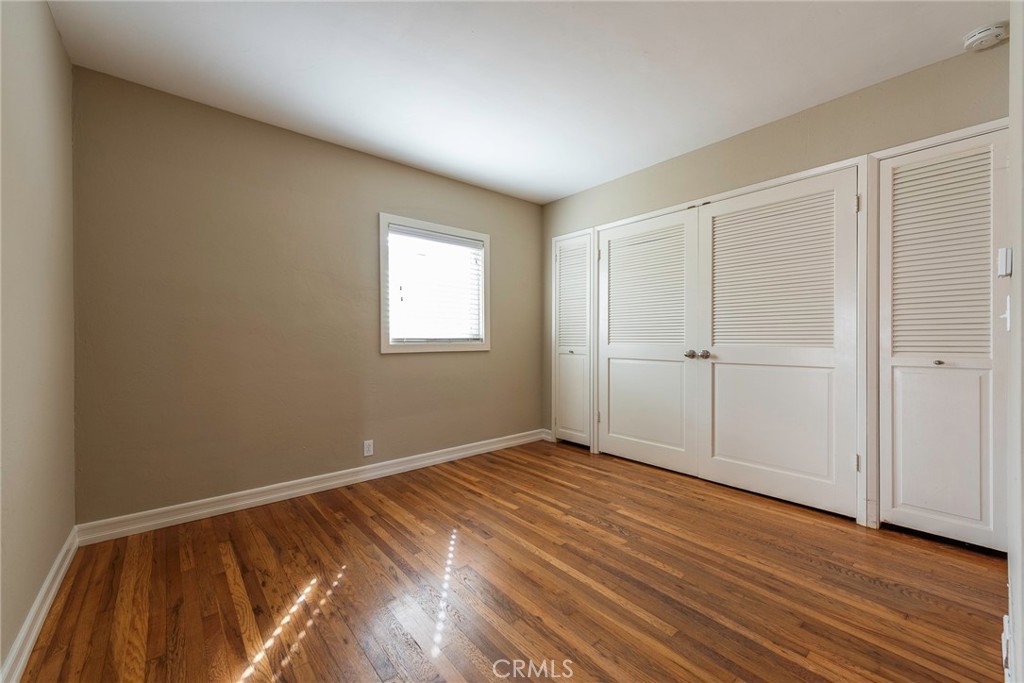 4697 Sierra Street Riverside, CA 92504 - Photo 20 of 51 a view of an empty room with wooden floor
