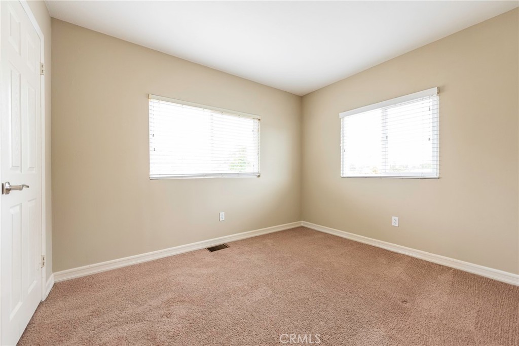 4697 Sierra Street Riverside, CA 92504 - Photo 35 of 51 an empty room with a window