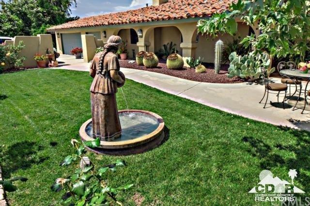 34480 Sycamore Springs Road Hemet, CA 92544 - Photo 1 of 24 a front view of a house with garden
