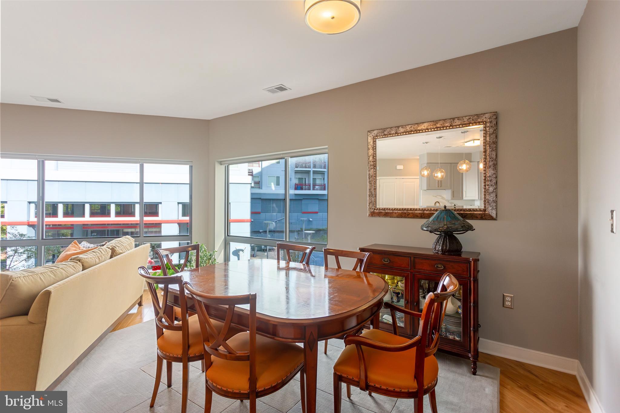 8005 13th Street, Unit 305 Silver Spring, MD 20910 - Photo 25 of 40 a dining room with furniture and window