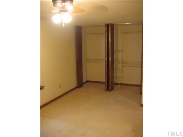 7334 Shellburne Drive Raleigh, NC 27612 - Photo 12 of 19 a view of an empty room